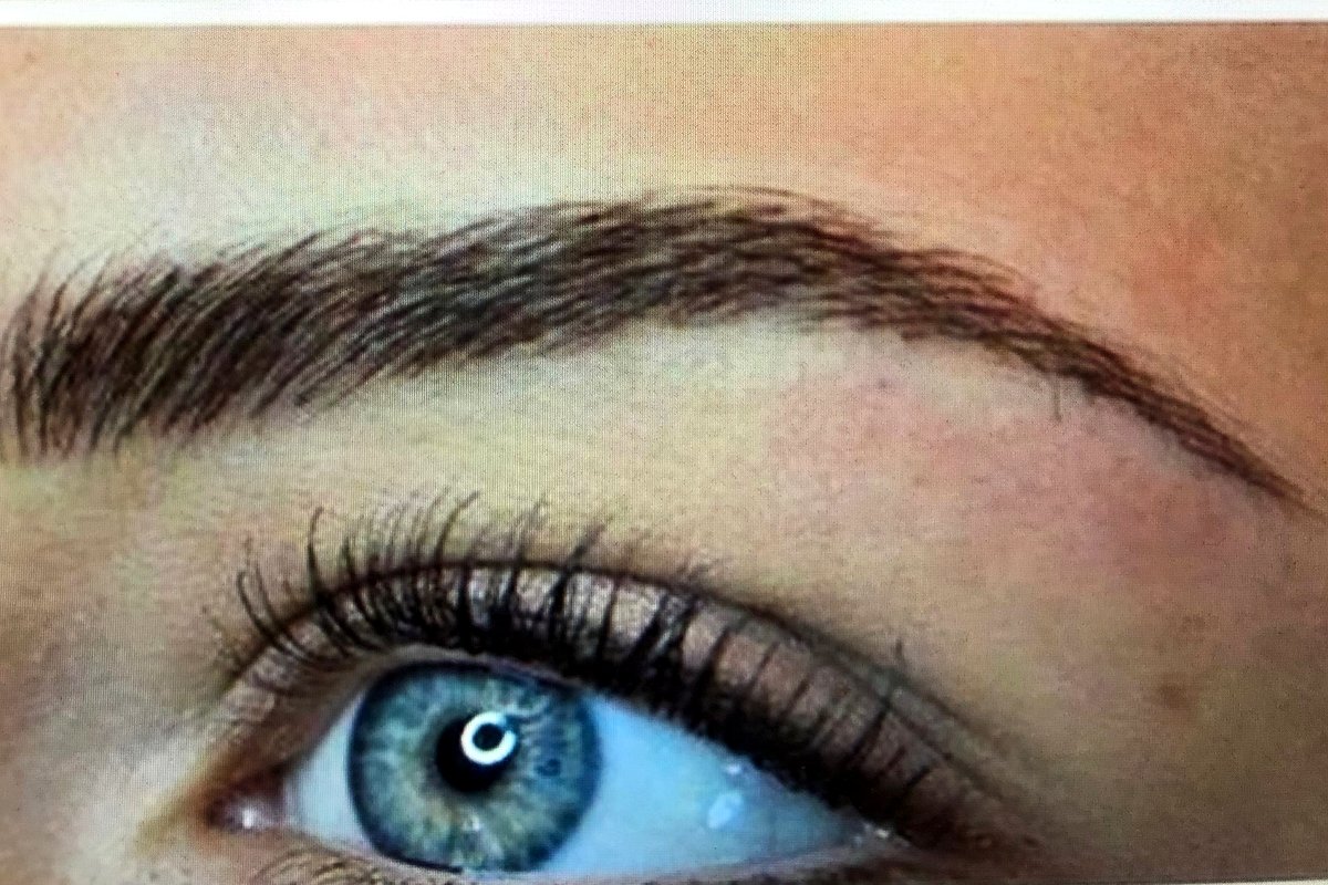 Brow after permanent makeup, closed eye, healed result